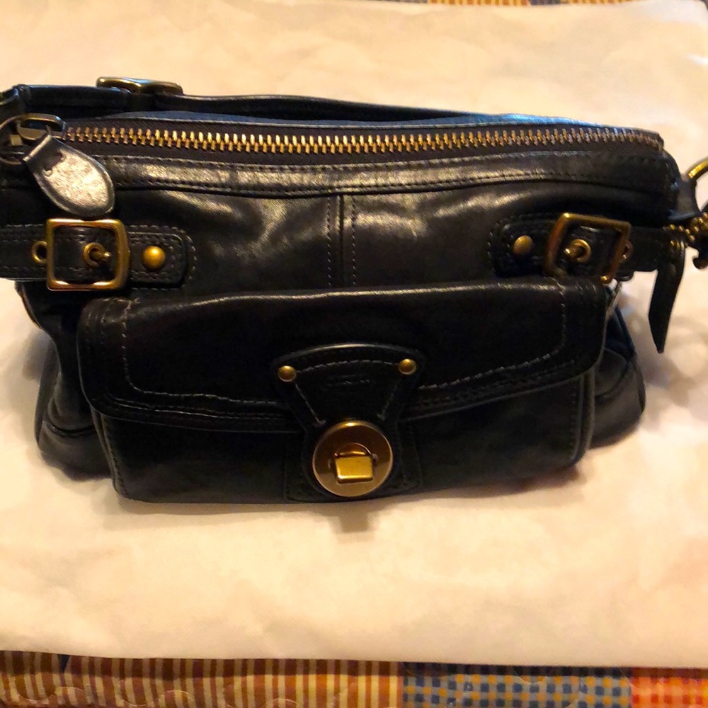 Black leather Coach satchel handbag.